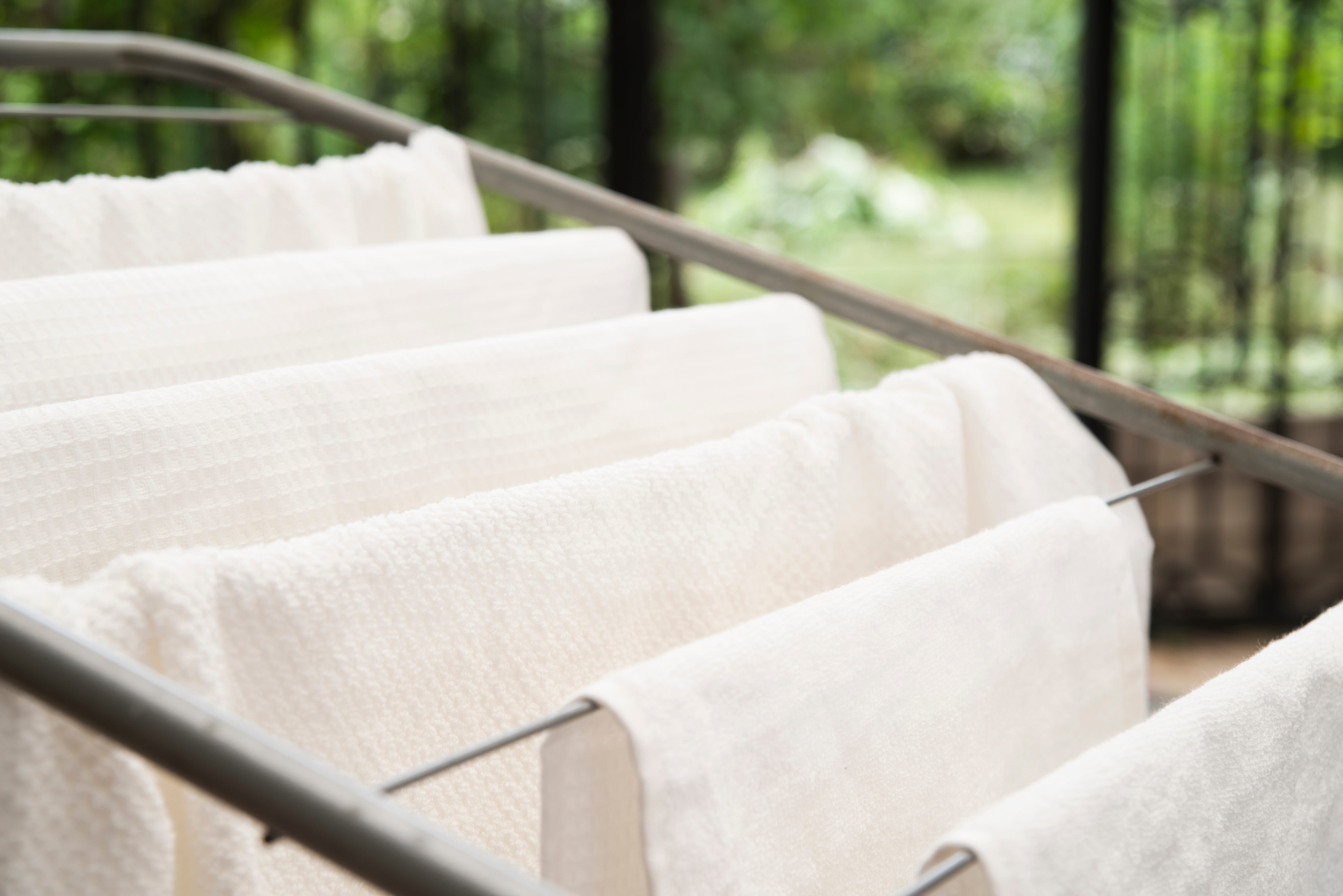 white towels drying outside